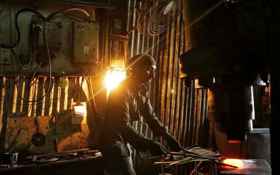 Industrial production growth slips to 2% from 7% in June