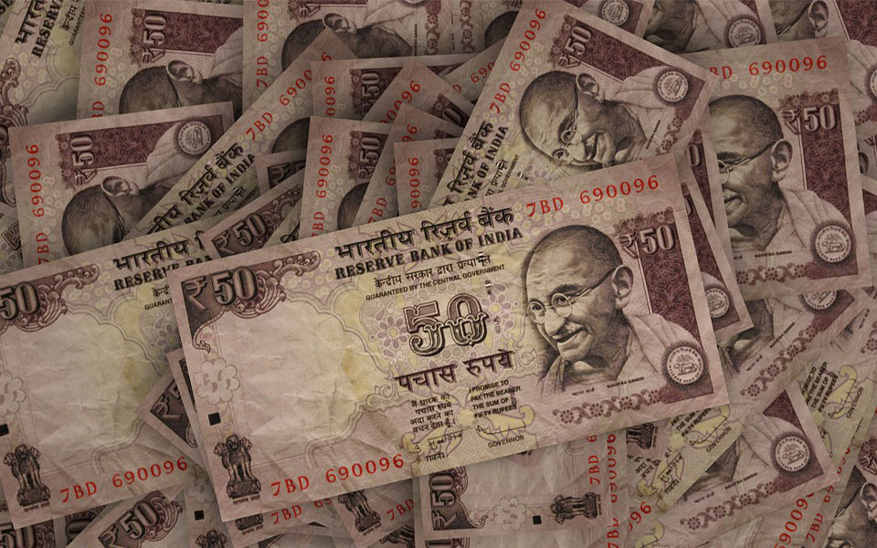 Rupee breaks 3-day rally, down 3 Paise at 63.87 a dollar