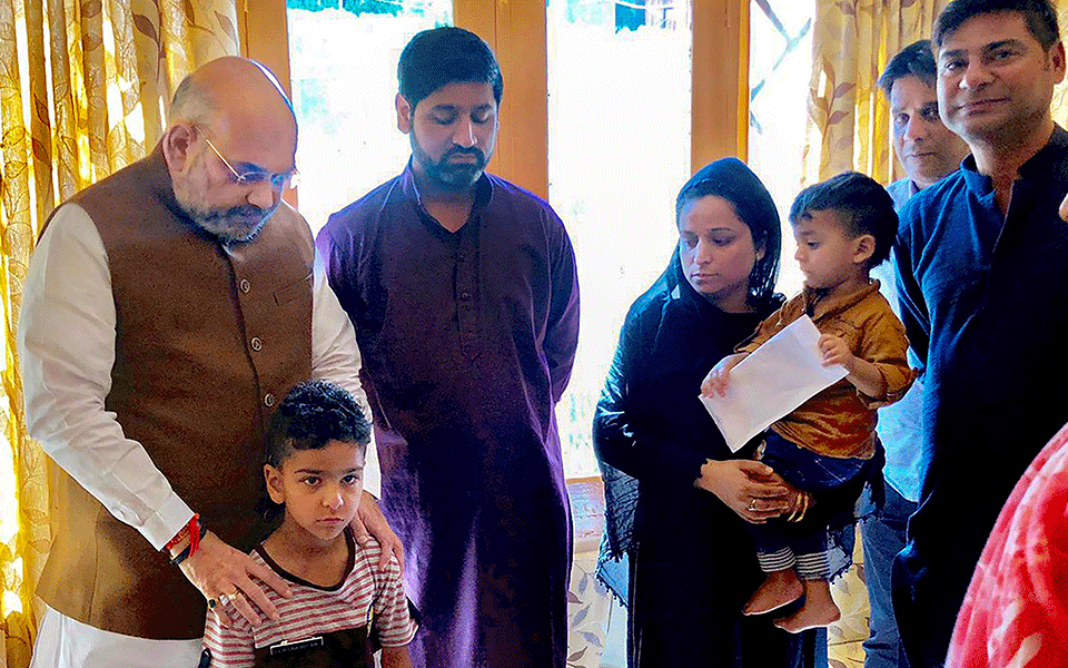 Nation is proud of your son, Amit Shah tells family of slain JK police officer