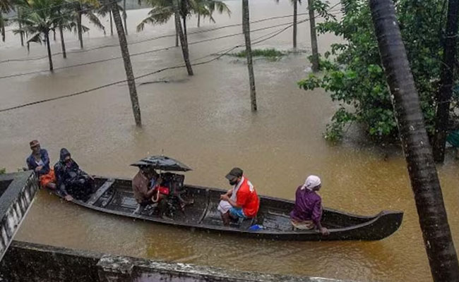 Heavy rains prompt warnings and travel bans in many Kerala districts
