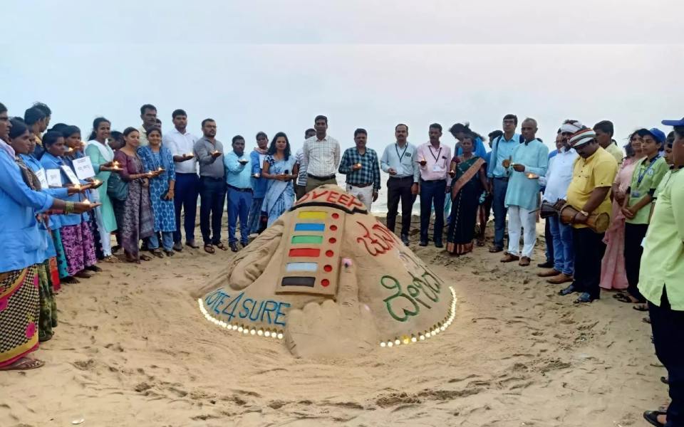Sand sculpture urging people to vote attracts visitors to Ullal beach