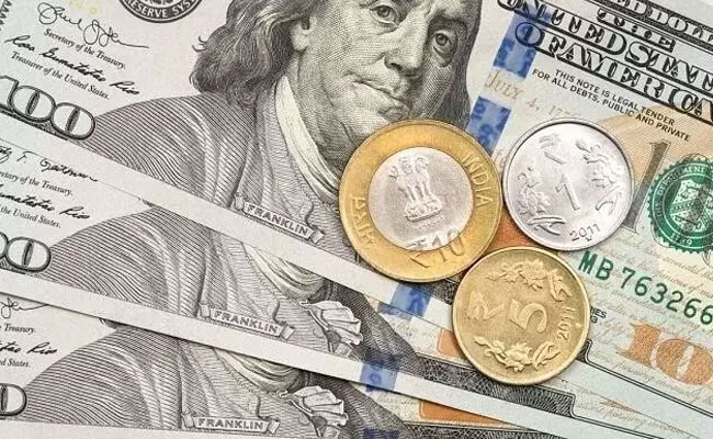 Rupee rises 5 paise to close at 90.69 against US dollar