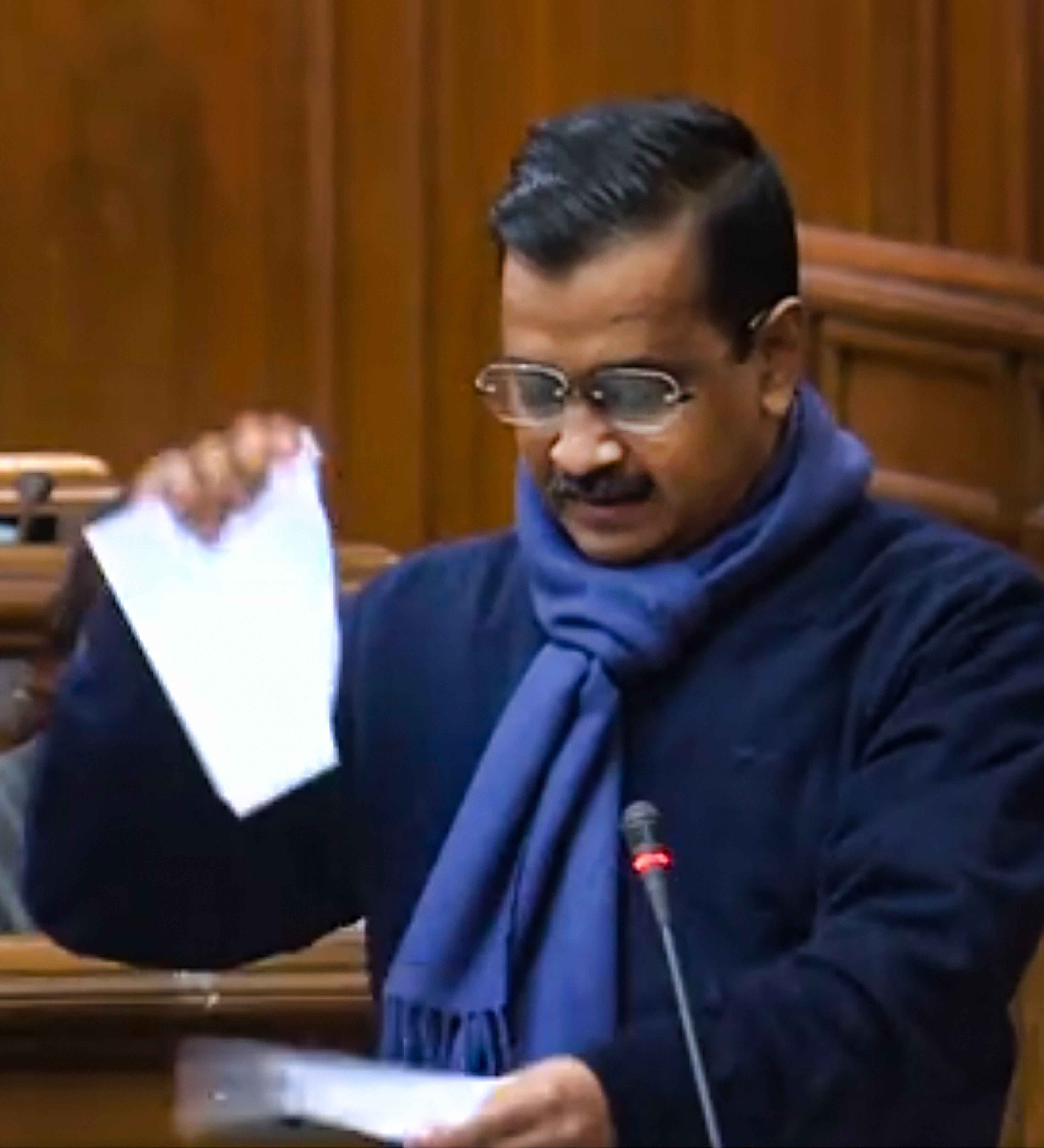 Kejriwal tears copies of Centre's farm laws, says cannot 'betray' farmers