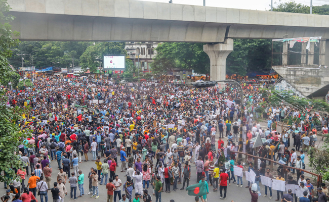 Bangladeshis protest against violence on minorities; Nobel laureate Muhammad Yunus condemns attacks