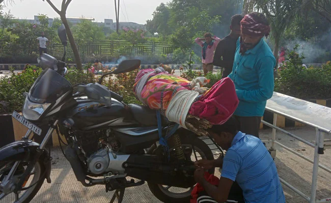 MP: Man takes mother's body on motorcycle due to unavailability of hearse at govt hospital