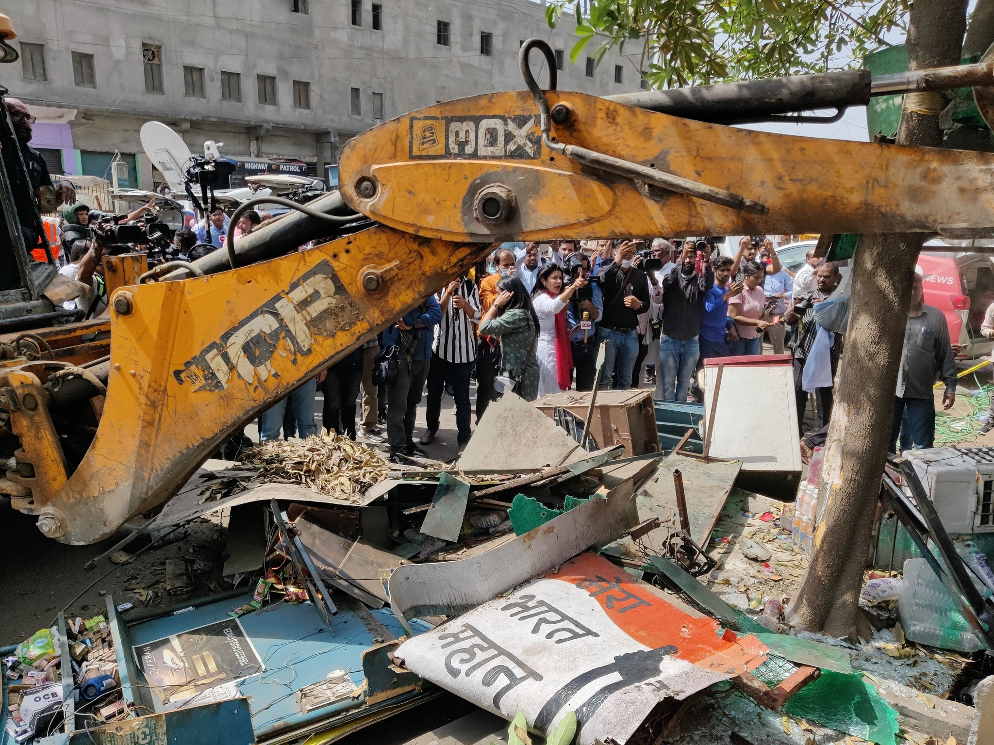 Jahangirpur demolition drive: Aaj Tak anchor Anjana Om Kashyap sits in bulldozer