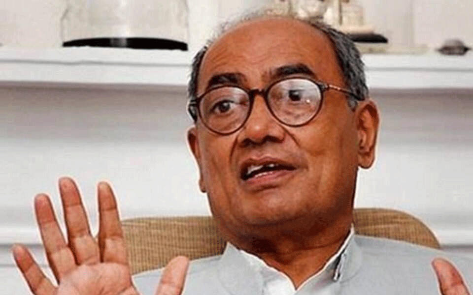 Digvijaya Singh opts out of Cong prez race, to back Kharge