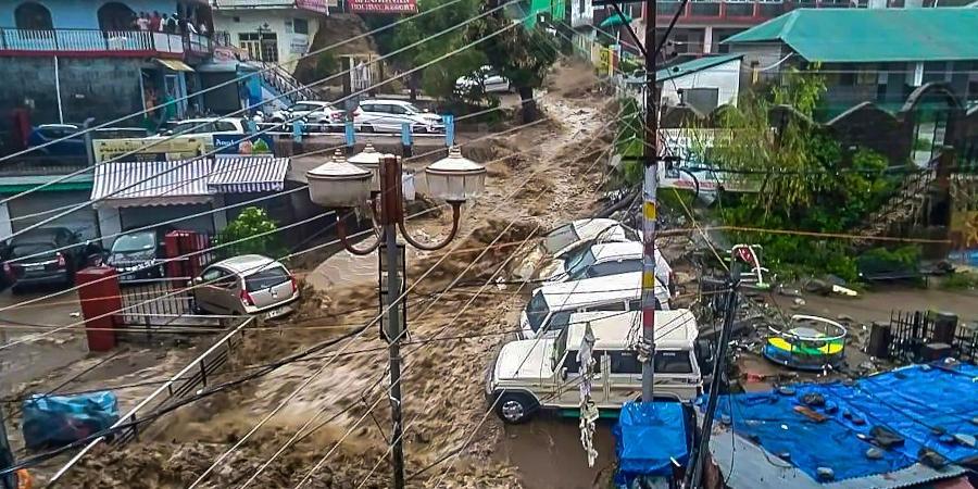 Cars, buildings swept away in flash floods triggered by heavy rains in Himachal's Dharamshala