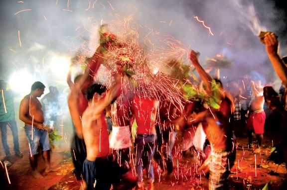 In this village of Goa, people celebrate Holi with fire shower!