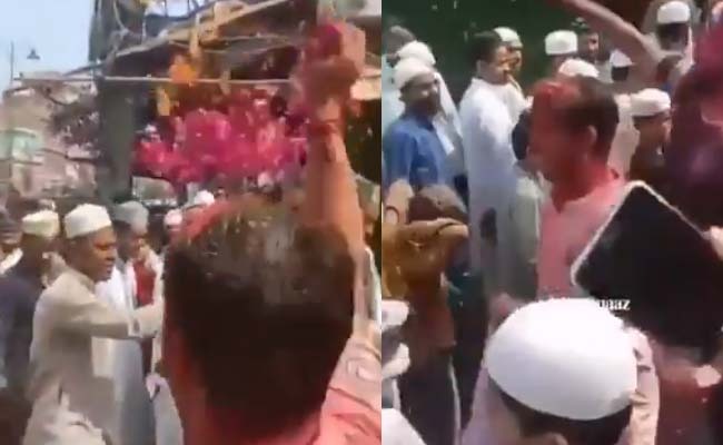 Muslims showered with flowers amid Holi celebrations in Seelampur