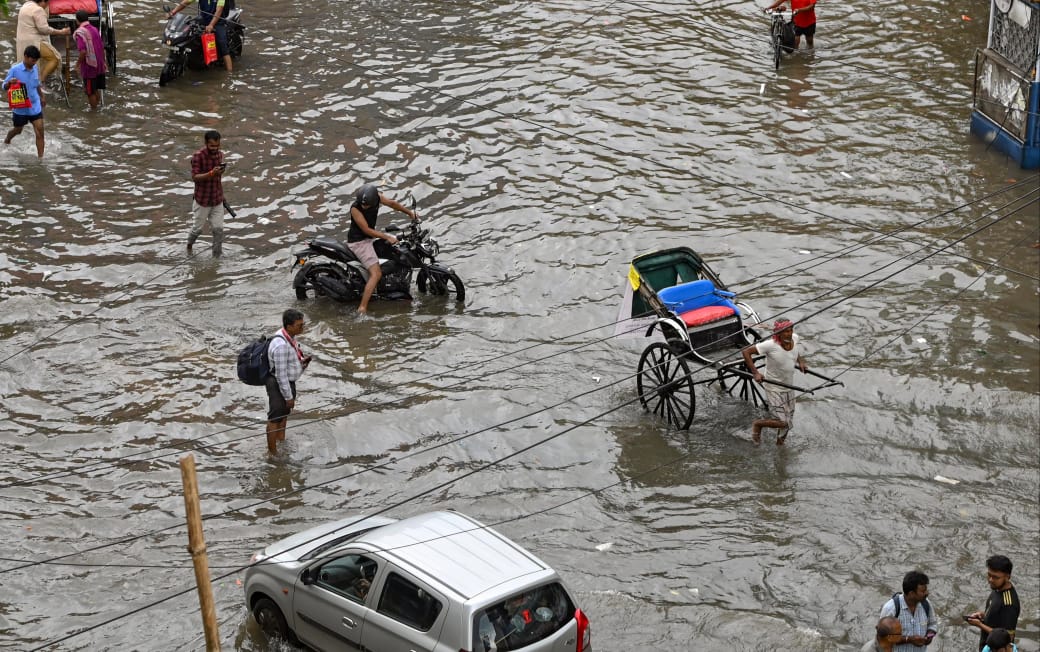 Seven die of electrocution as record rain paralyses Kolkata; Mamata blames dredging, CESC