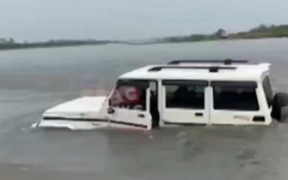 Vehicle carrying EVM sinks in Assam river
