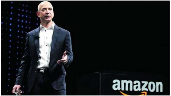 Amazon founder Jeff Bezos riding his own rocket in July, joining 1st crew