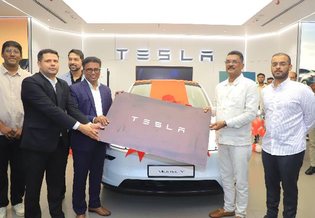 Maharashtra minister Sarnaik receives first delivery of car from Tesla showroom in Mumbai
