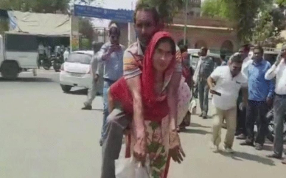 Woman carried husband on back for days, finally got disability certificate for him