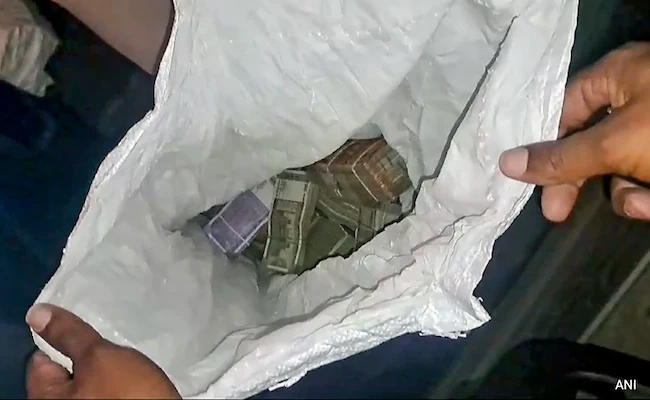 Bundles of currency notes recovered from heap of cow dung in Odisha