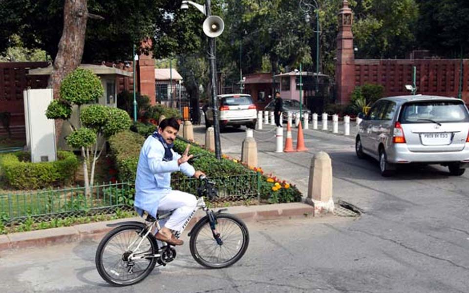 MPs ride bicycles, wear masks, drive e-cars to reach Parliament for Winter Session