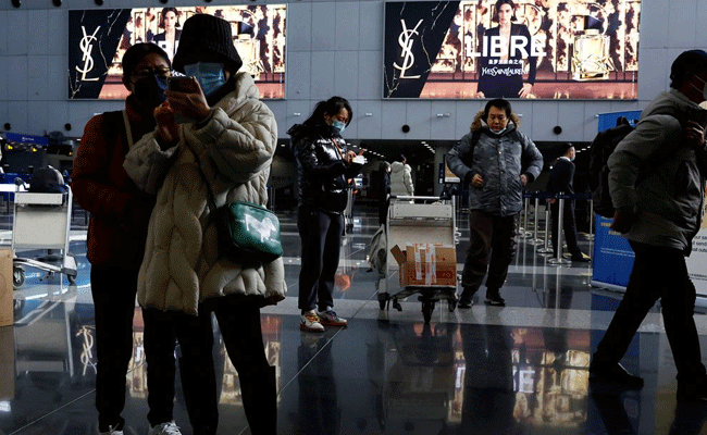 China to reopen borders, scrap quarantine for international travellers from Jan 8