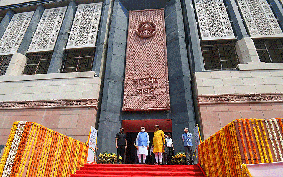 PM Modi unveils national emblem on Parliament building