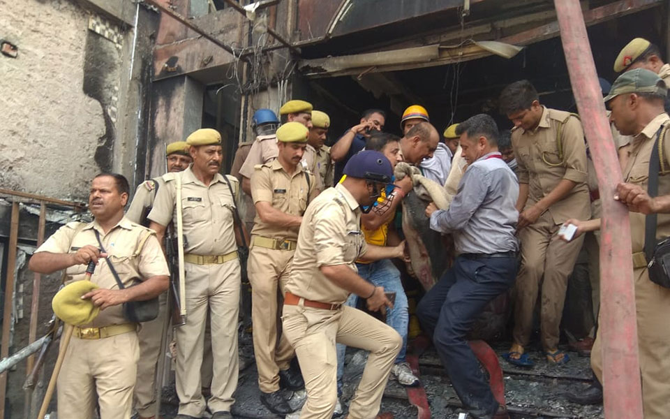 Five dead as blaze guts two Lucknow hotels, owners booked