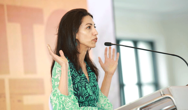 Former White House political staffer Huma Abiden interacts with Civil Services aspirants