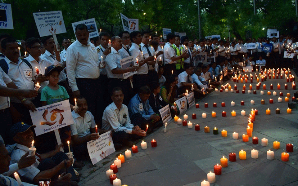 Jet Airways employees take out candle march
