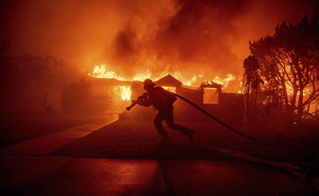 Over 50,000 under evacuation orders, warnings as wildfire imperils homes north of Los Angeles