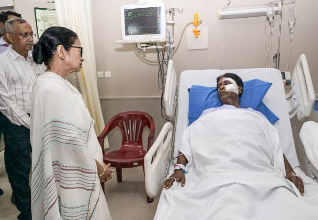 Mamata visits injured BJP MP Khagen Murmu at Siliguri hospital, assures him of all help