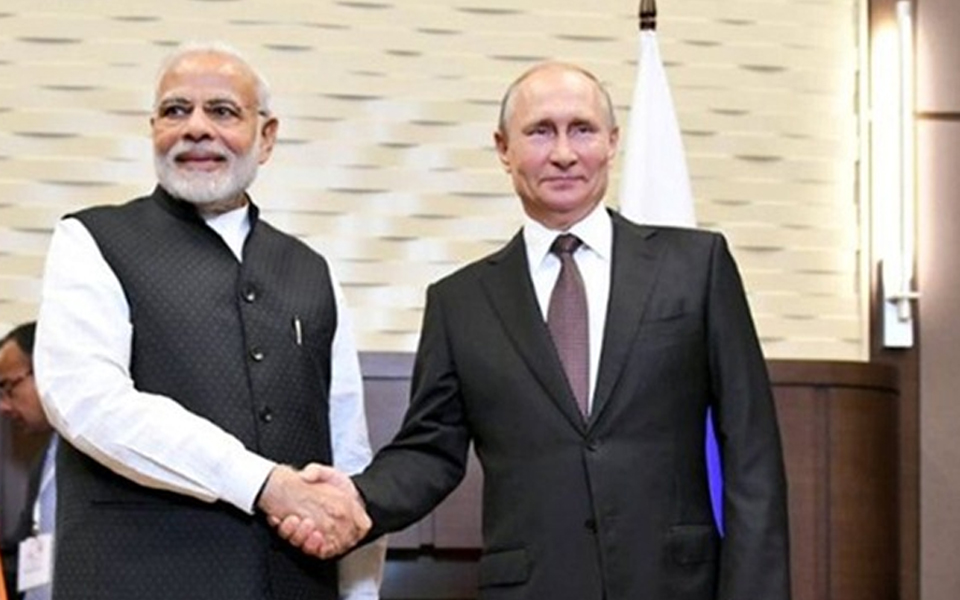 Putin arrives in India for summit with Modi