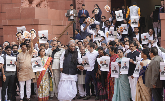 INDIA bloc MPs protest over Adani issue in Parliament complex