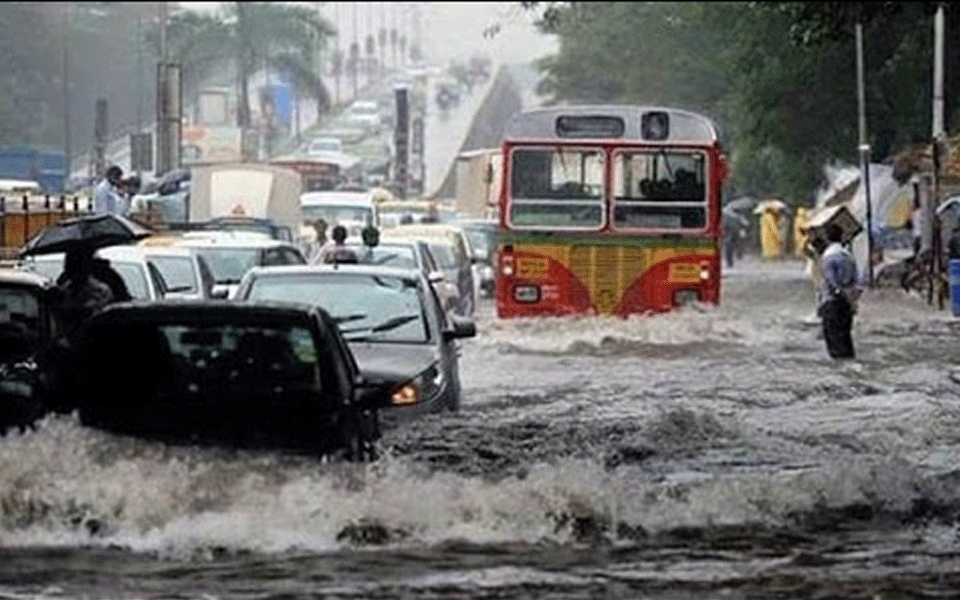 Monsoon hits Mumbai with a bang; flights, trains, road traffic hit