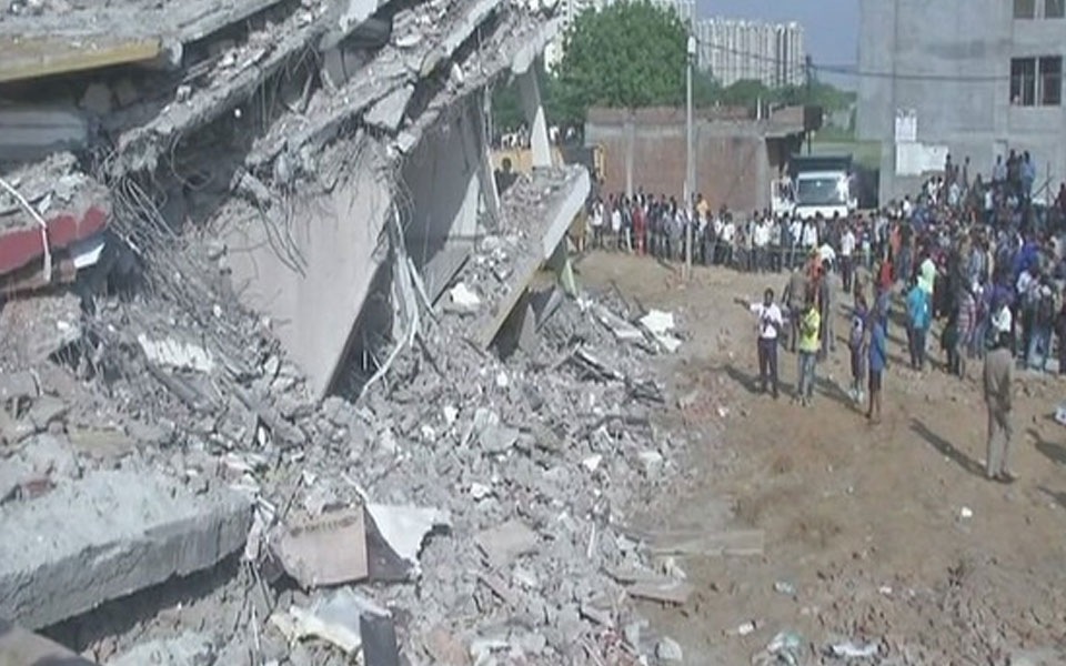 3 dead, many trapped in Greater Noida twin-building collapse