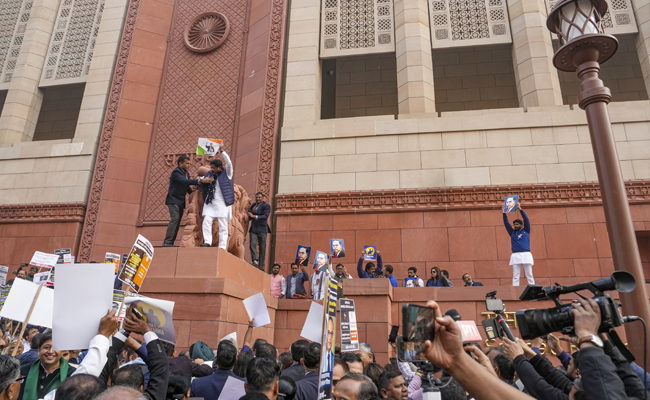 NDA, INDIA bloc MPs protest in Parl premises; BJP alleges Rahul pushed its MP