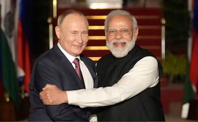 PM Modi presents copy of Gita in Russian to Putin