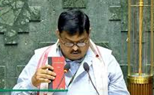 Rakibul Hussain takes oath as MP with pocket Constitution in hand