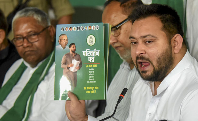 RJD releases poll manifesto; promises 1 crore govt jobs, Rs 1 lakh to poor 'sisters'