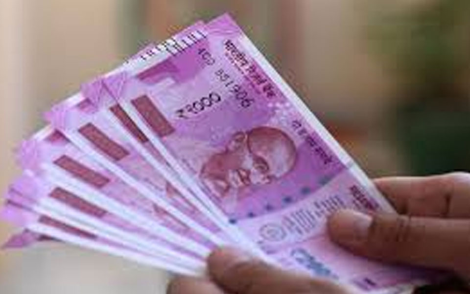 Rupee devalues to record low near 70.20