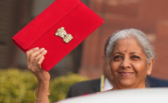 Sitharaman takes Tablet in red pouch to present paperless budget
