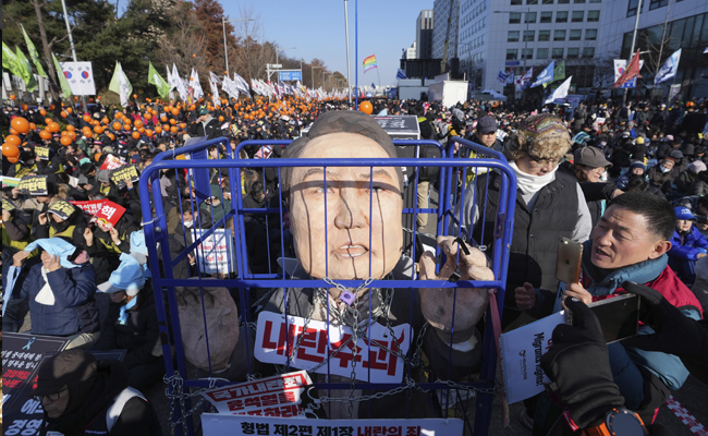 South Korea's impeached President Yoon detained in massive law-enforcement effort