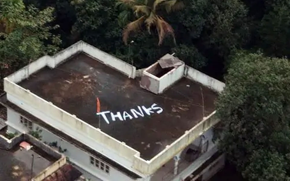 'Thanks' Painted On Rooftop Where Pregnant Woman Was Rescued By Navy