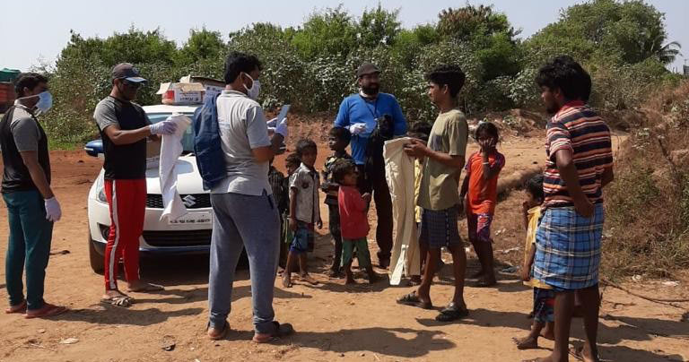 Mangaluru: 'Team B-Human' distributes clothes, footwear to migrant workers