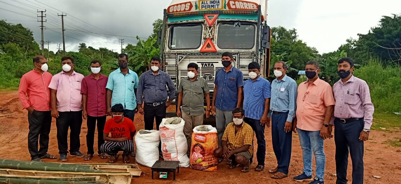 Two arrested while smuggling 49 kg Ganja in container truck in Udupi