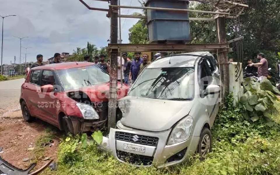 Head-on collision of cars in Manipal: One car caught between roadside transformer poles