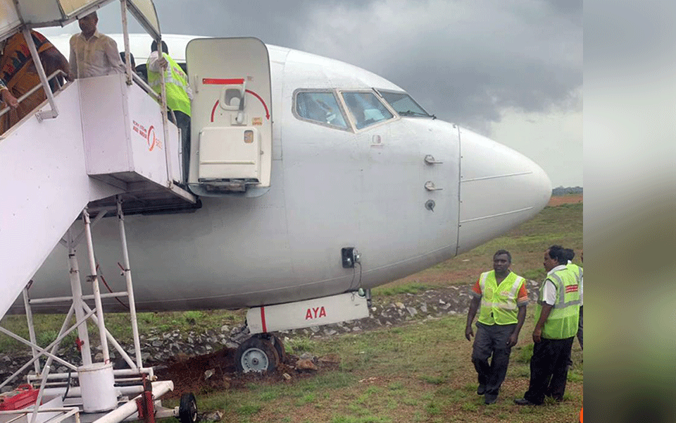 Air India flight veers off after landing at Mangaluru airport, gets stuck in grass