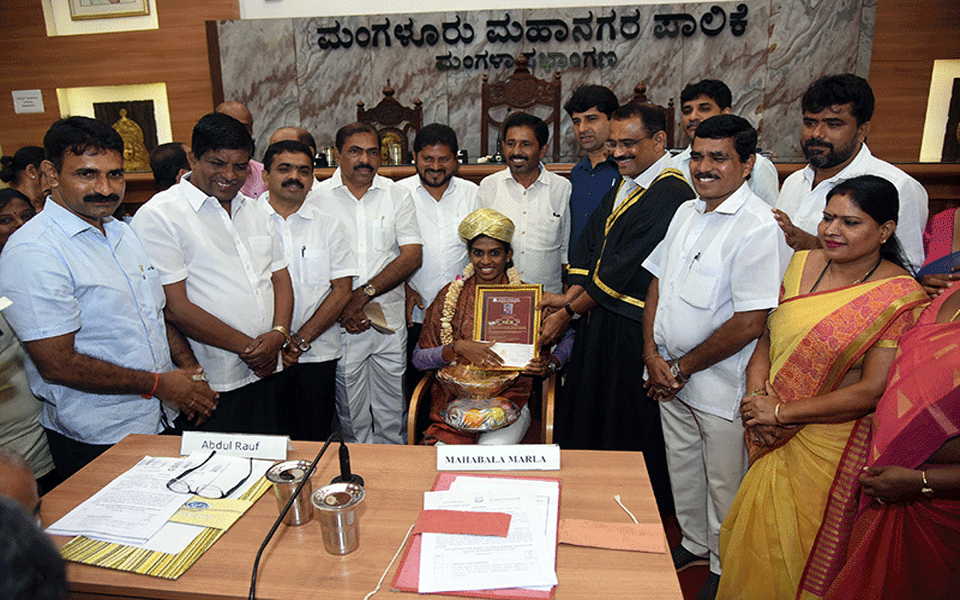 Mangalore City Corporation felicitates Poovamma