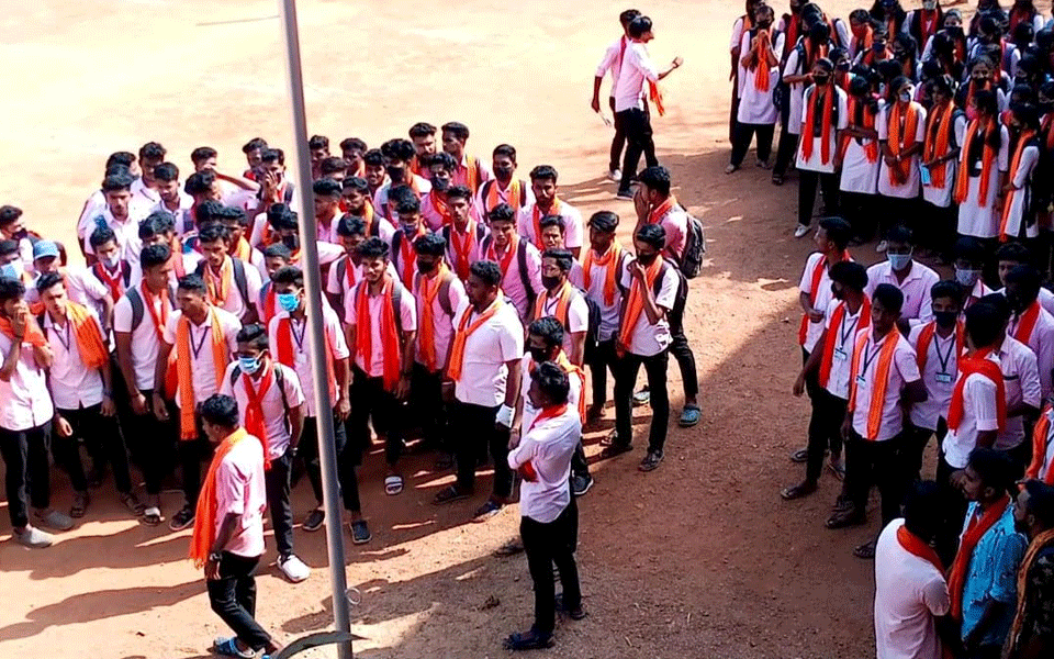 Students arrive wearing saffron shawls at Bantwal Vamadapadavu College 