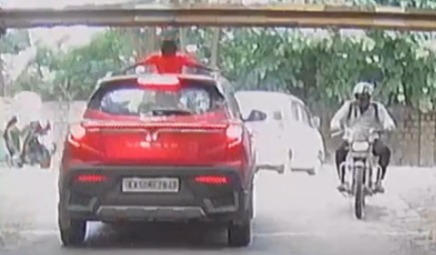 Bengaluru: Child hits traffic barrier while standing through sunroof