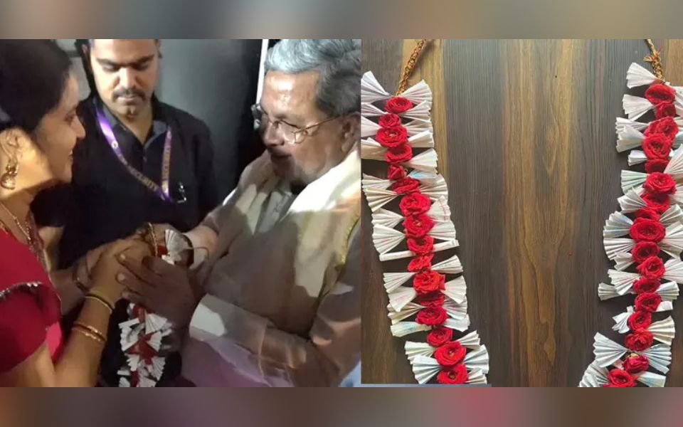 Student presents garland made of free bus tickets to CM Siddaramaiah to express gratitude