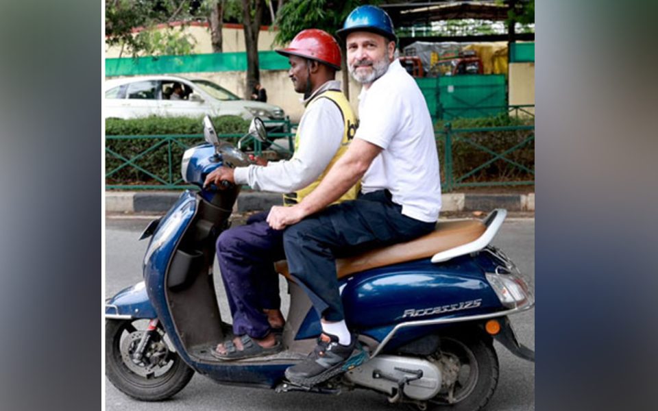 Rahul Gandhi rides scooter with delivery boy in Bangaluru during election campaign