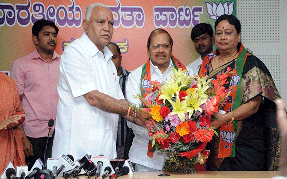 Former Minister Baburao Chinchansur joins BJP along with wife